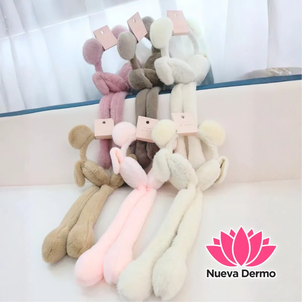OREJERAS LEVANTA OREJAS DE OSITO CON POMPONES – CITY GIRL