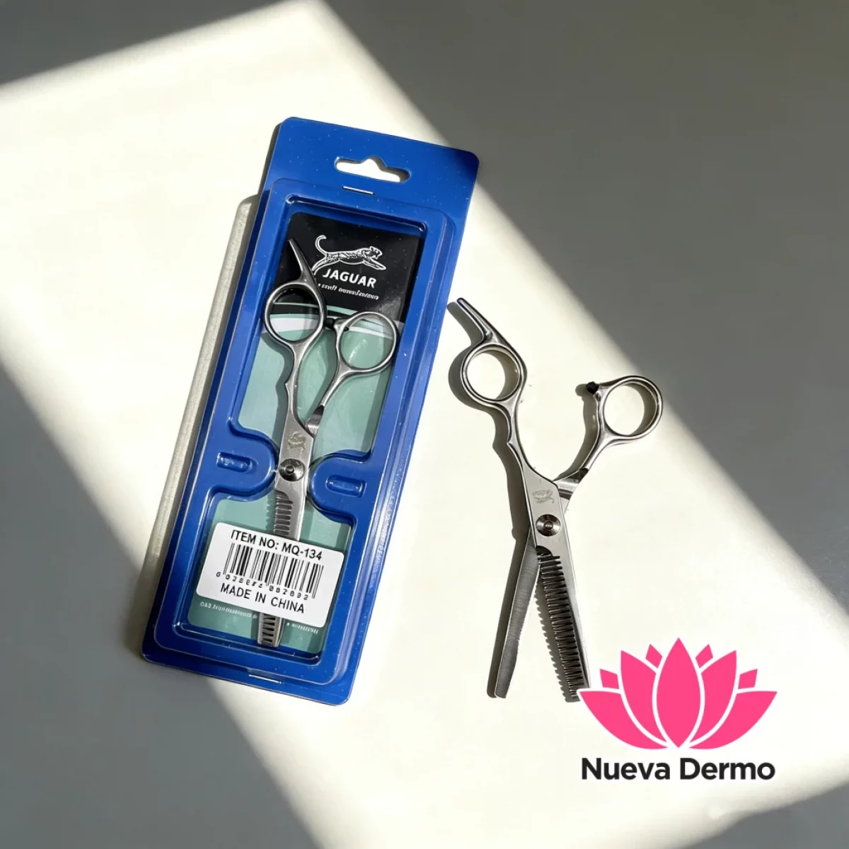 Tijera entresaca profesional para peluquería marca(jaguar)